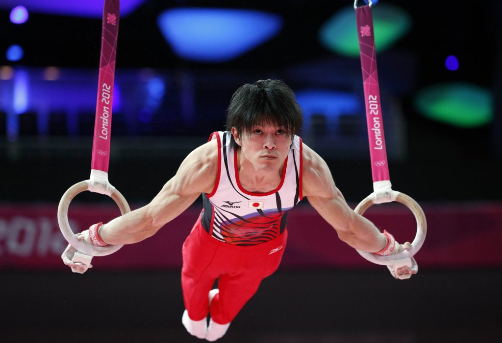 Japanese gymnastics world champion Kohei Uchimura takes part in a training session at 02 North Greenwich Arena in London on July 25, 2012 two days ahead the start of the London 2012 Olympic Games. AFP PHOTO / THOMAS COEX